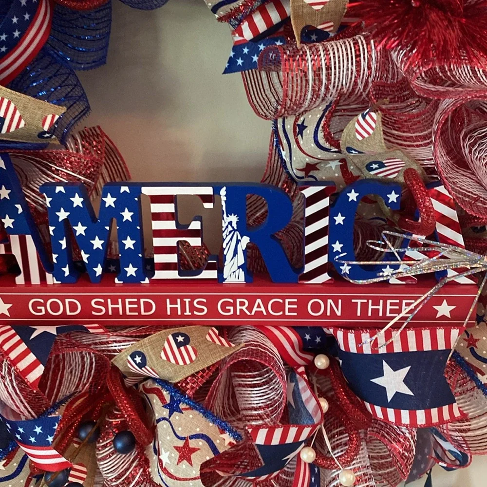 America, God shed his grace on thee! wreath
